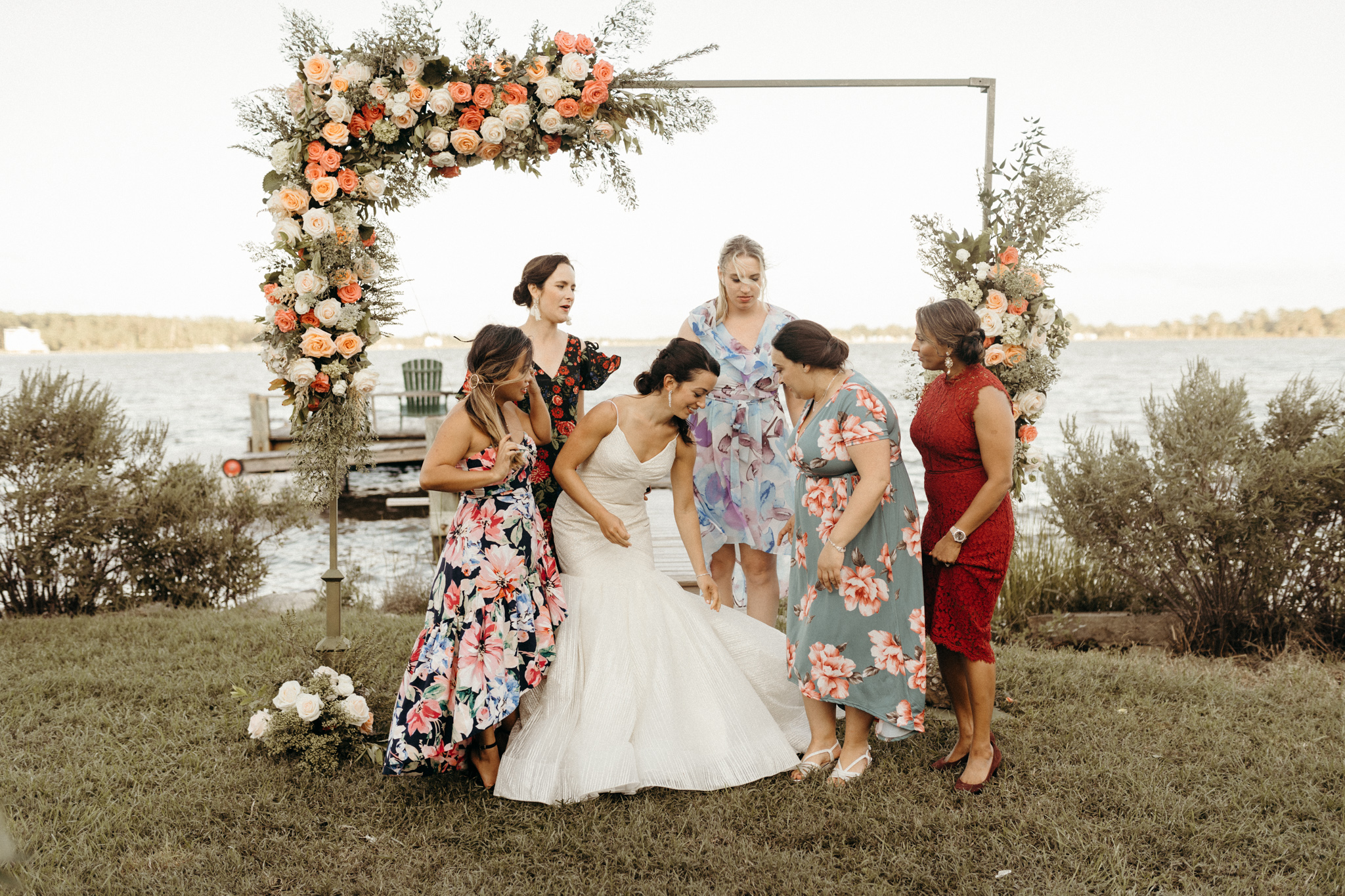 Laid-back eastern shore micro-wedding at a waterfront rental house with pops of pinks & oranges paired with casual greenery // maryland wedding photographer