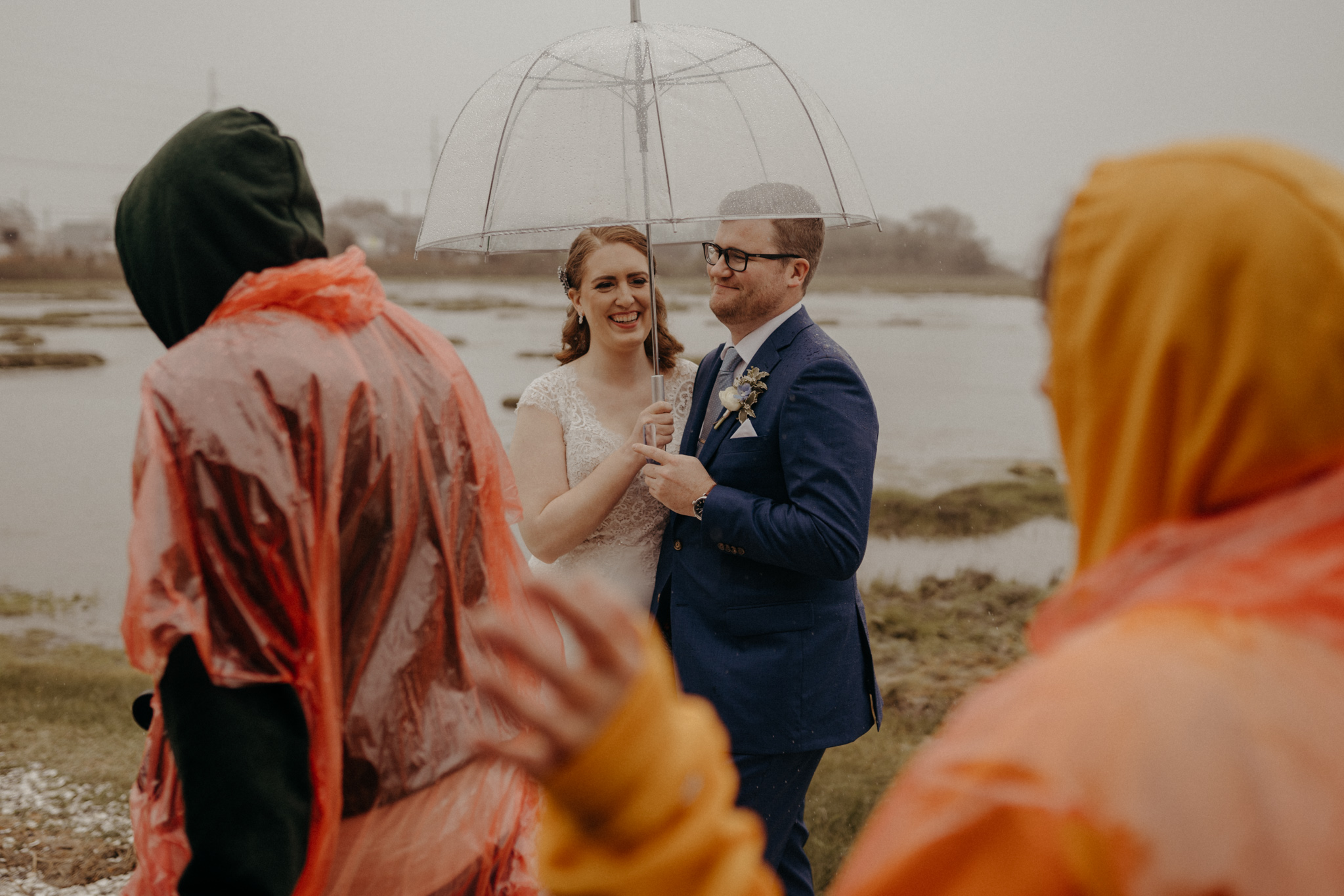 Bride and Groom with Umbrellas in Cape May New Jersey Wedding