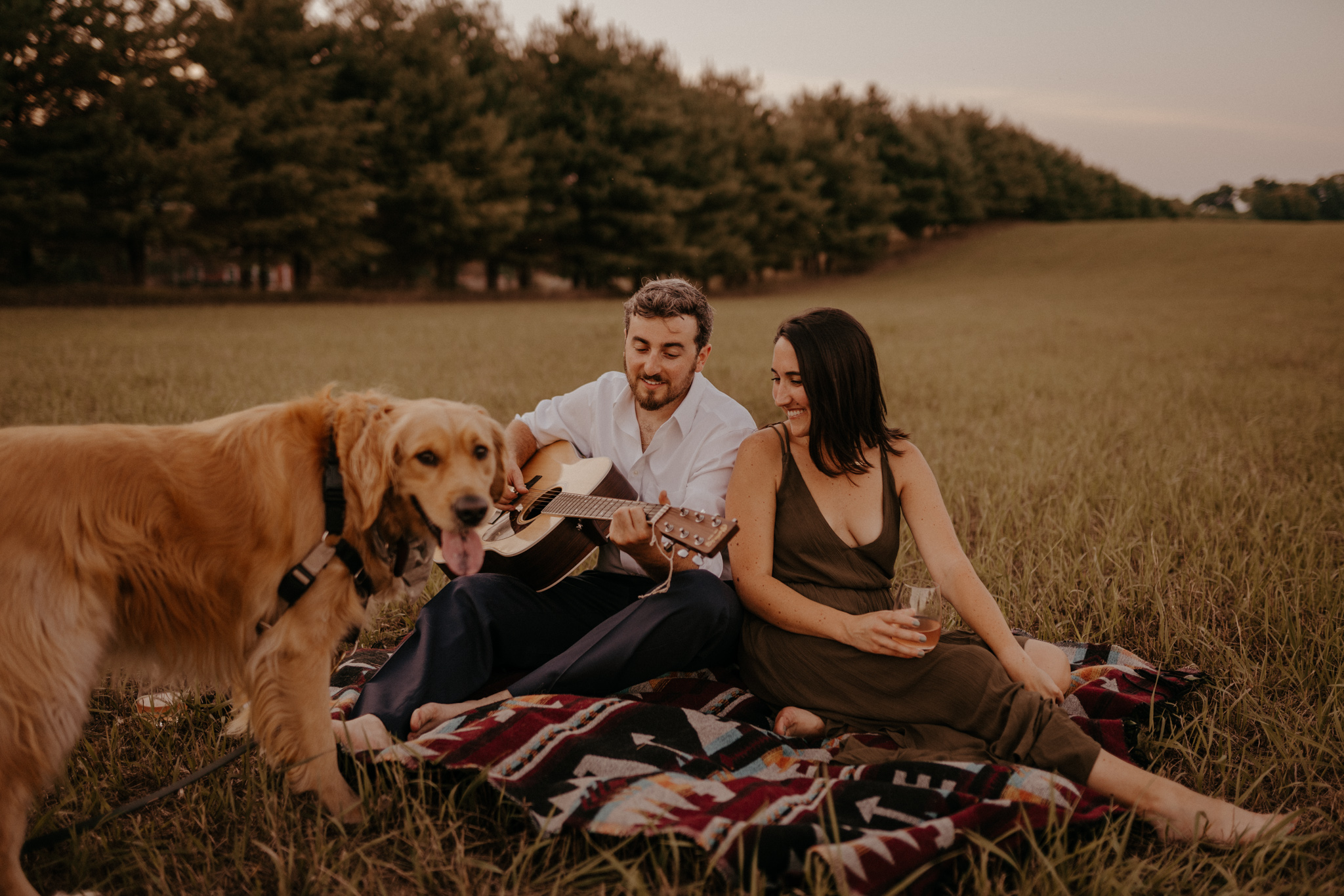 Folk summer engagement session adventure in harpers ferry nature with tall grasses & their golden retriever, Maryland wedding photographer
